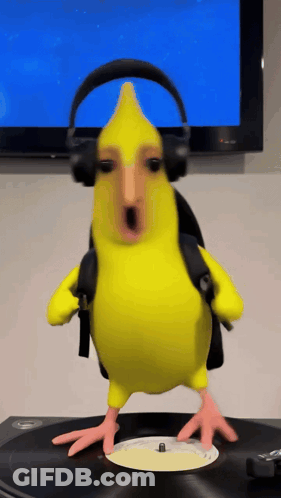 Yellow Bird Wearing Headphones On Record Player GIF