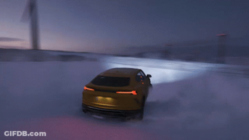 Yellow Car Driving Through Snowy Field GIF