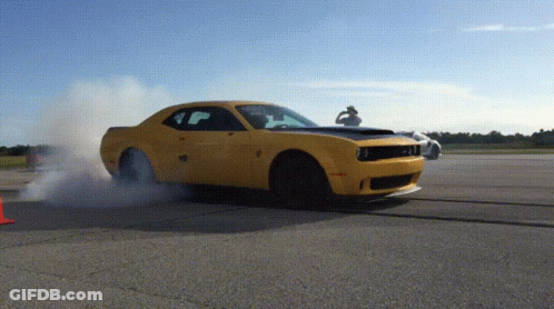 Yellow Car Driving With Smoke GIF