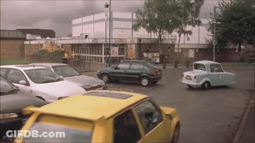 Yellow Car Parked In Parking Lot GIF