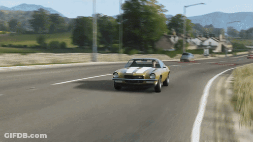 Yellow Car With White Stripes Driving GIF