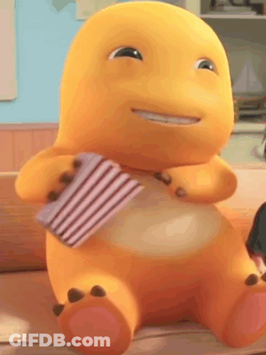 Yellow Cartoon Character Holding Box Of Popcorn GIF
