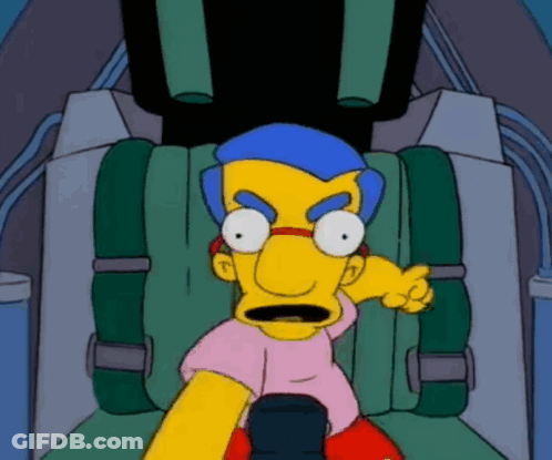 Yellow Cartoon Character With Blue Hair Sitting In Green Seat GIF
