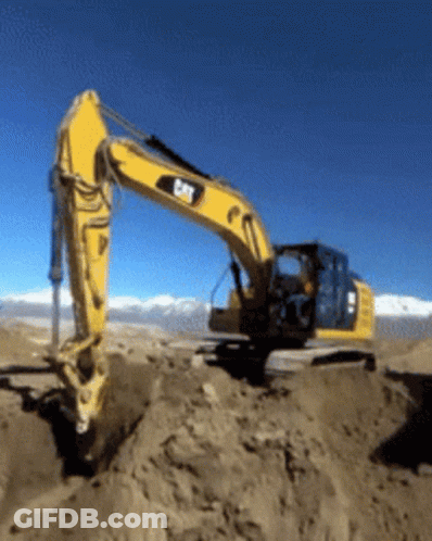 Yellow Cat Excavator Digging Hole In Sand GIF