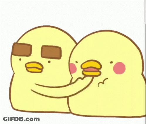 Yellow Chickens Standing Next To Each Other GIF