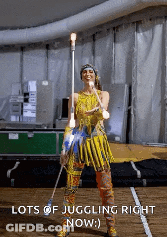Yellow Dress Woman Juggling Stick Lots Of Juggling GIF