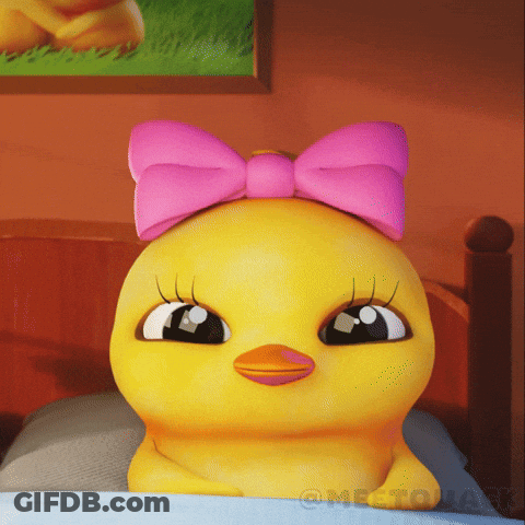 Yellow Duck With Pink Bow On Bed GIF