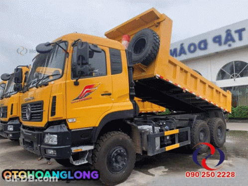 Yellow Dump Truck In Front Of Building Saying Maoa GIF