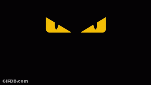Yellow Eyes On Black Background GIF