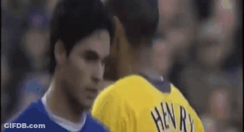 Yellow Henry Jersey Man Talking To Blue Shirt GIF
