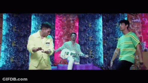 Yellow Jacket Man Playing Guitar Two Dancing Men Colorful Wall GIF