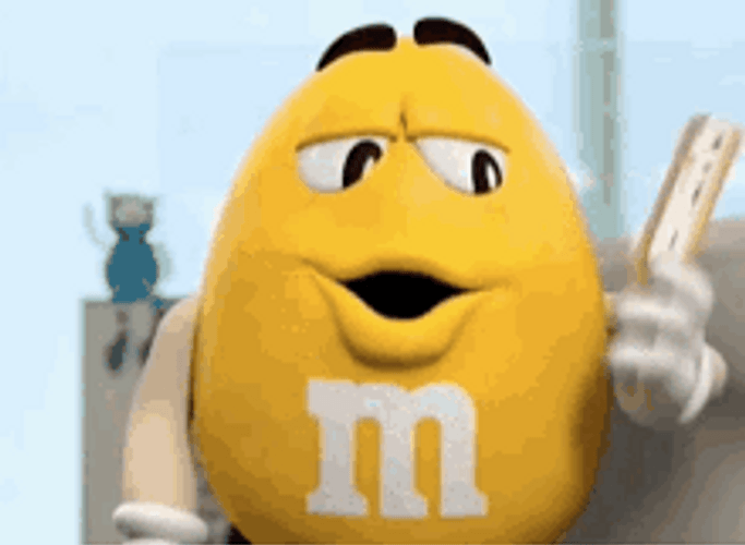 Yellow M And M's Using Fan GIF