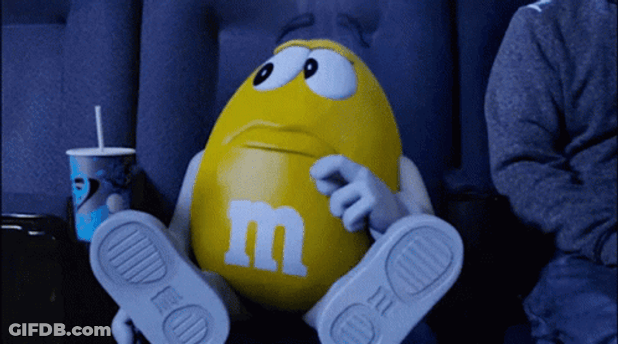 Yellow M&Ms Feed Me GIF