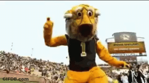 Yellow Mascot With Number 1 In Front Of Crowd GIF