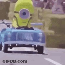 Yellow Minion Driving Blue Toy Car GIF