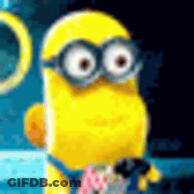 Yellow Minion Wearing Glasses Holding Microphone GIF