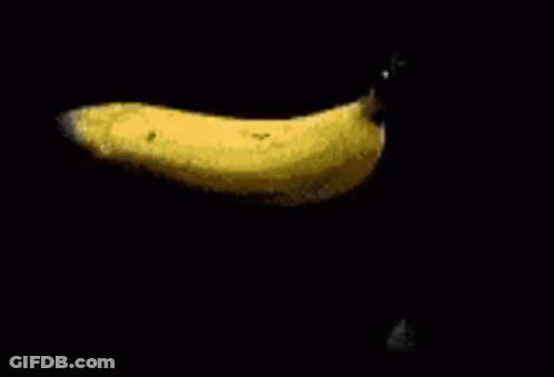 Yellow Object Cut In Half With Knife GIF
