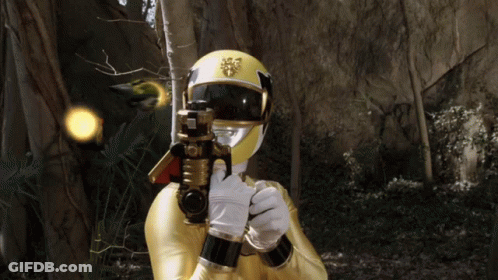 Yellow Power Ranger Holding Gun GIF