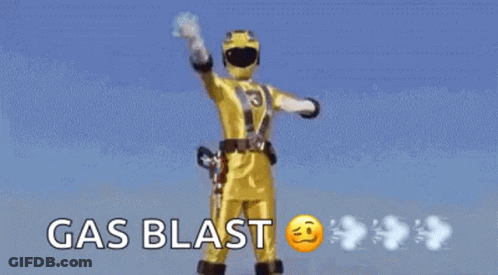 Yellow Power Ranger Standing In Rain Gas Blast GIF
