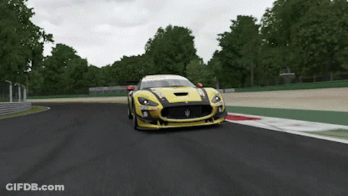 Yellow Race Car Driving On Track GIF
