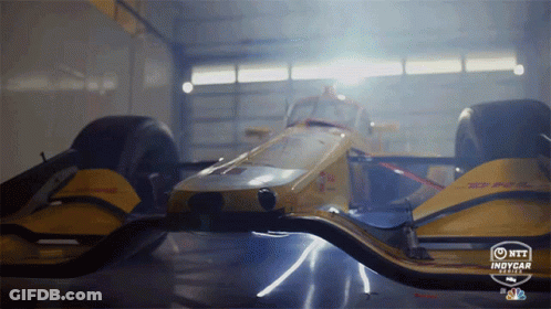 Yellow Race Car In Garage GIF