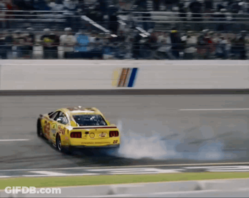 Yellow Race Car Number 24 GIF