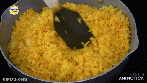 Yellow Rice Being Stirred With Spatula Made In Animotica GIF