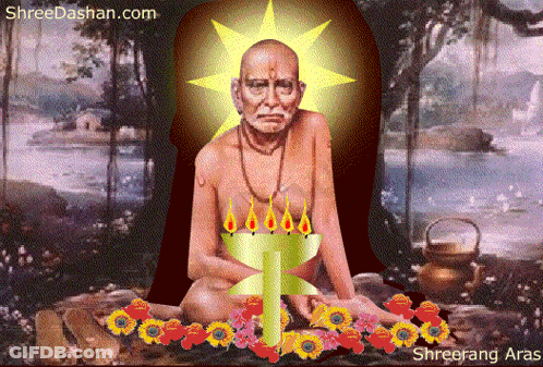 Yellow Robe Man Sitting With Purple Box GIF