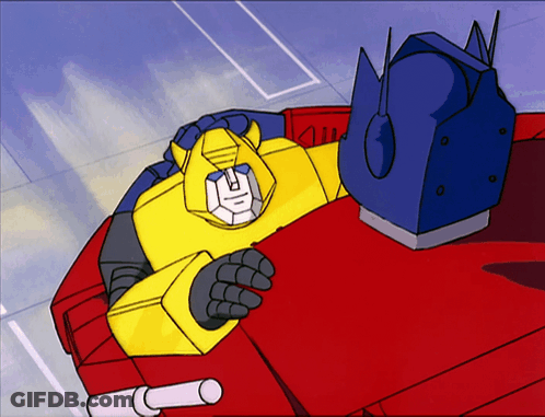 Yellow Robot Laying On Top Of Red One GIF