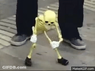 Yellow Skeleton Next To Person's Feet GIF