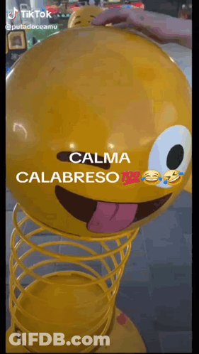 Yellow Smiley Ball Saying Calma Calabreso GIF
