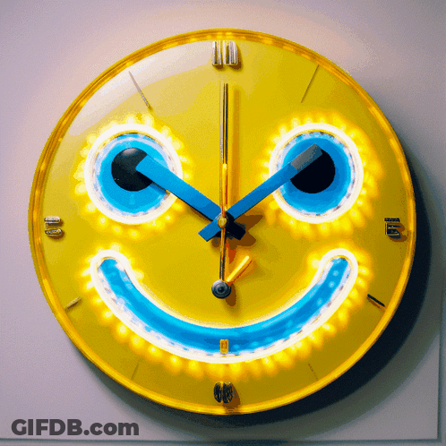 Yellow Smiley Clock Showing 10 And 11 GIF