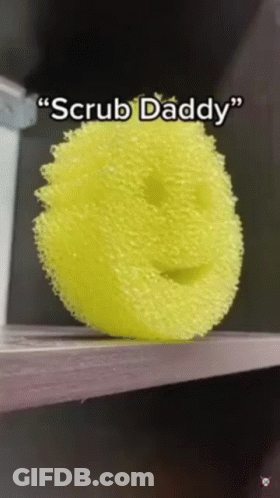 Yellow Smiley Sponge Saying Scrub Daddy GIF