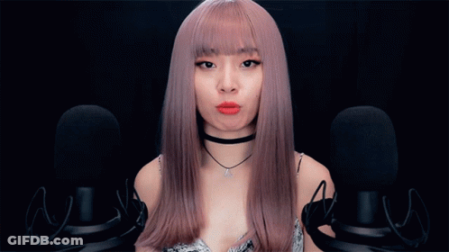 Yellow Smiley With Hand Behind Saying Envy GIF