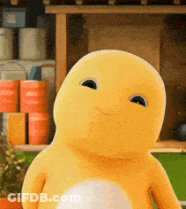 Yellow Stuffed Animal By Shelf Of Cans GIF