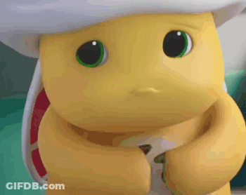 Yellow Stuffed Animal Green Eyes White Hat Looking GIF