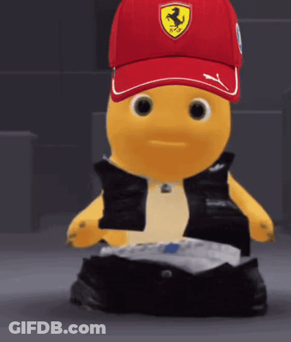 Yellow Stuffed Animal In Red Hat With Ferrari Logo GIF