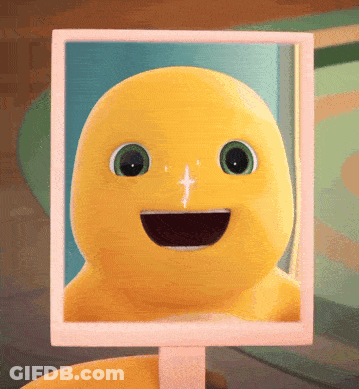 Yellow Stuffed Animal Smiling In Mirror GIF