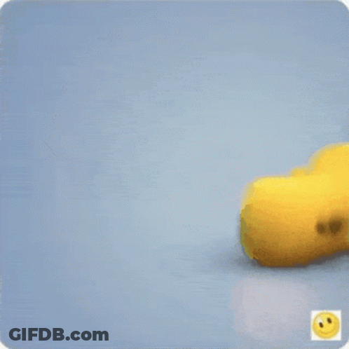 Yellow Stuffed Animal Walking With Smiley Face GIF