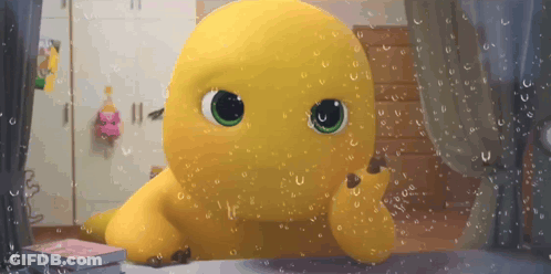 Yellow Stuffed Animal With Green Eyes Looking Out Rainy Window GIF
