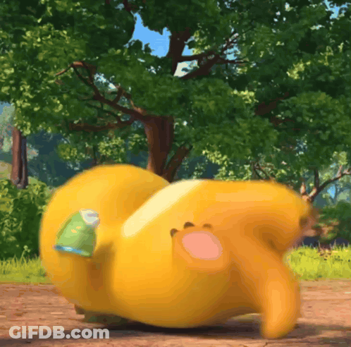 Yellow Stuffed Animal With Green Eyes Next To Child GIF