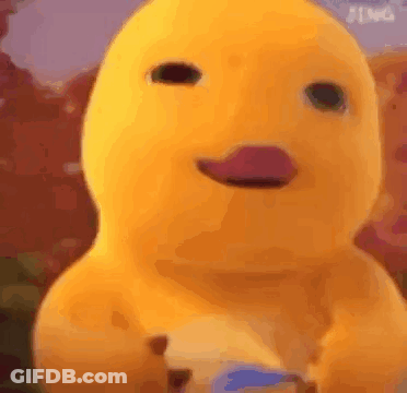 Yellow Stuffed Animal With Headphones Near Speakers GIF