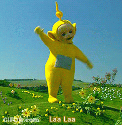Yellow Teletubbies Character In Yellow Flowers GIF