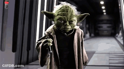 Yoda From Star Wars Holding Lightsaber GIF