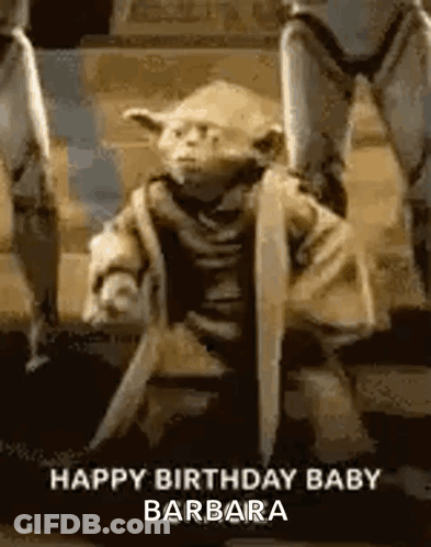 Yoda Statue Holding Sword And Shield GIF