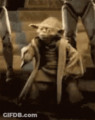 Yoda Statue Sitting In Dirt GIF
