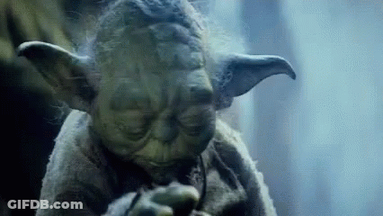 Yoda Statue Smoking Cigar GIF