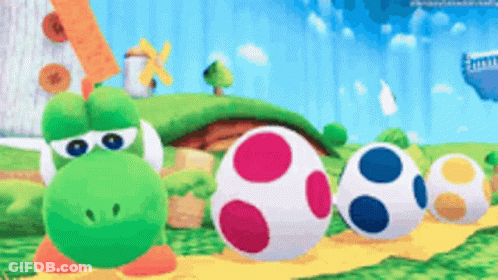 Yoshi Next To Colorful Eggs GIF