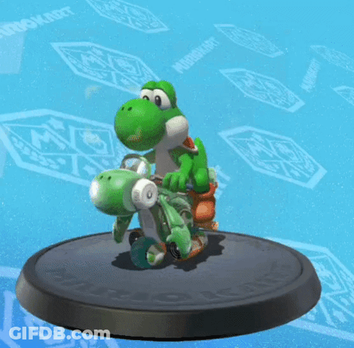 Yoshi Toy On Mario Kart Trophy GIF