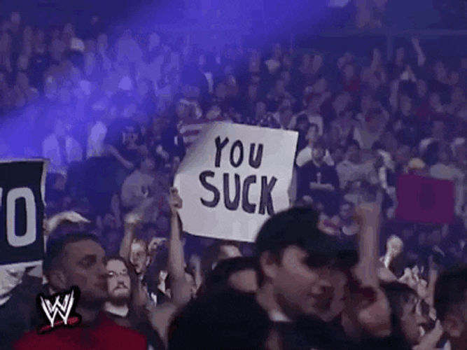 You Suck Placard Wrestle Mania GIF